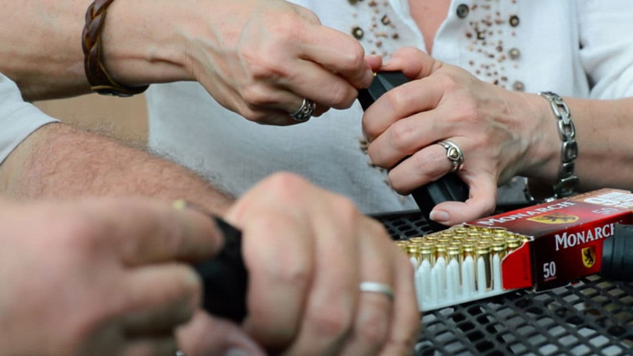 Tim and Susan Have Matching Handguns